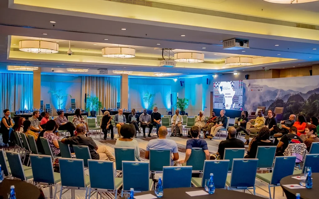 ALI-East Africa fellows seated in a large circle during an interactive leadership seminar.
